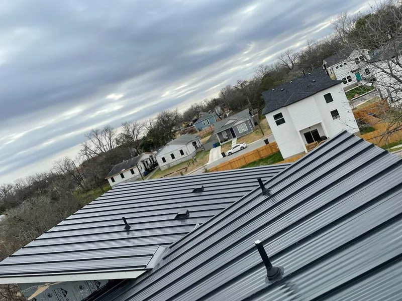 Standing seam metal roof panels with vents for Skylight Repair in Evergreen Park
